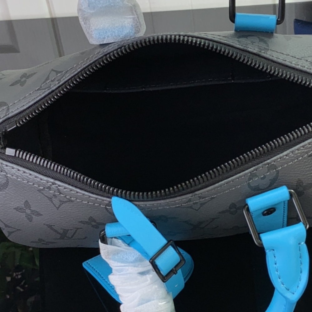 LV KEEPALL BANDOULIÈRE 25 MONOGRAM ECLIPSE REVERSE TURQUOISE 25CM M11645