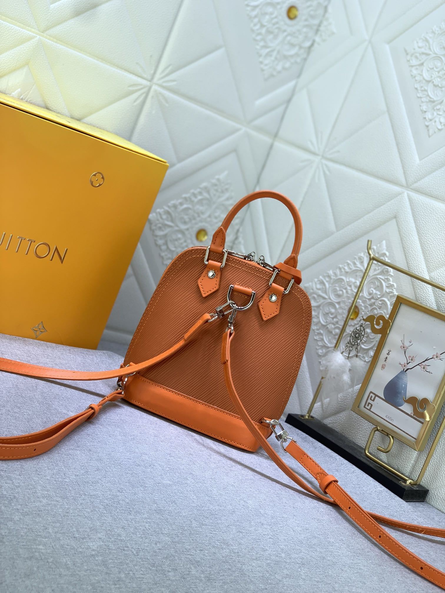 LV ALMA BACKPACK EPI LEATHER ORANGE 20CM M25104
