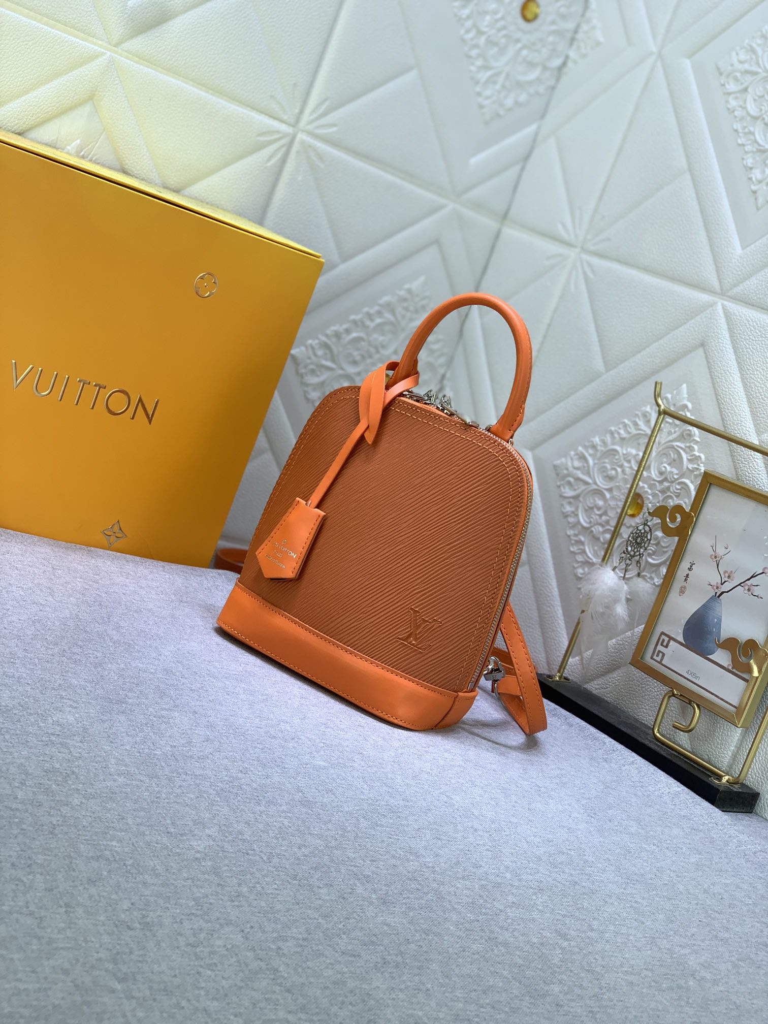 LV ALMA BACKPACK EPI LEATHER ORANGE 20CM M25104