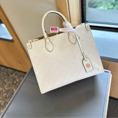 LV ON THE GO MM WHITE 35CM