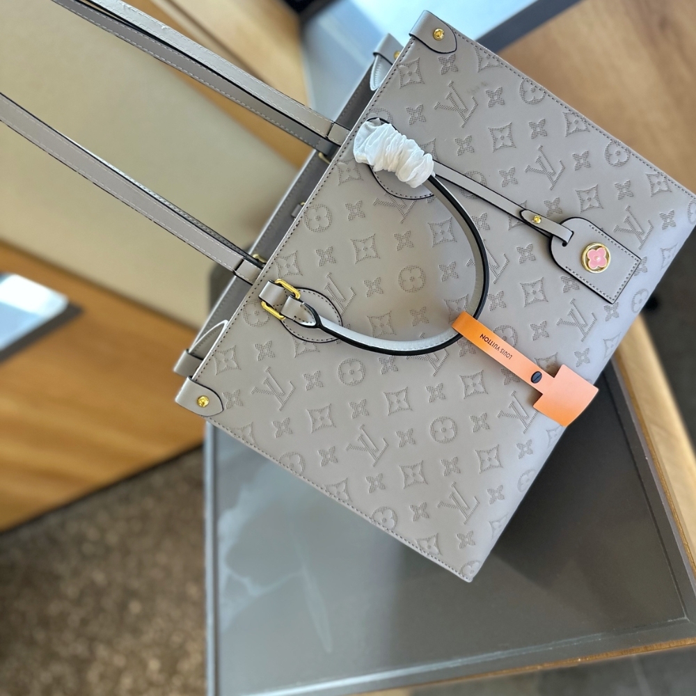 LV ON THE GO MM GREY 35CM