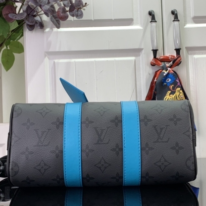 LV KEEPALL BANDOULIÈRE 25 MONOGRAM ECLIPSE REVERSE TURQUOISE 25CM M11645