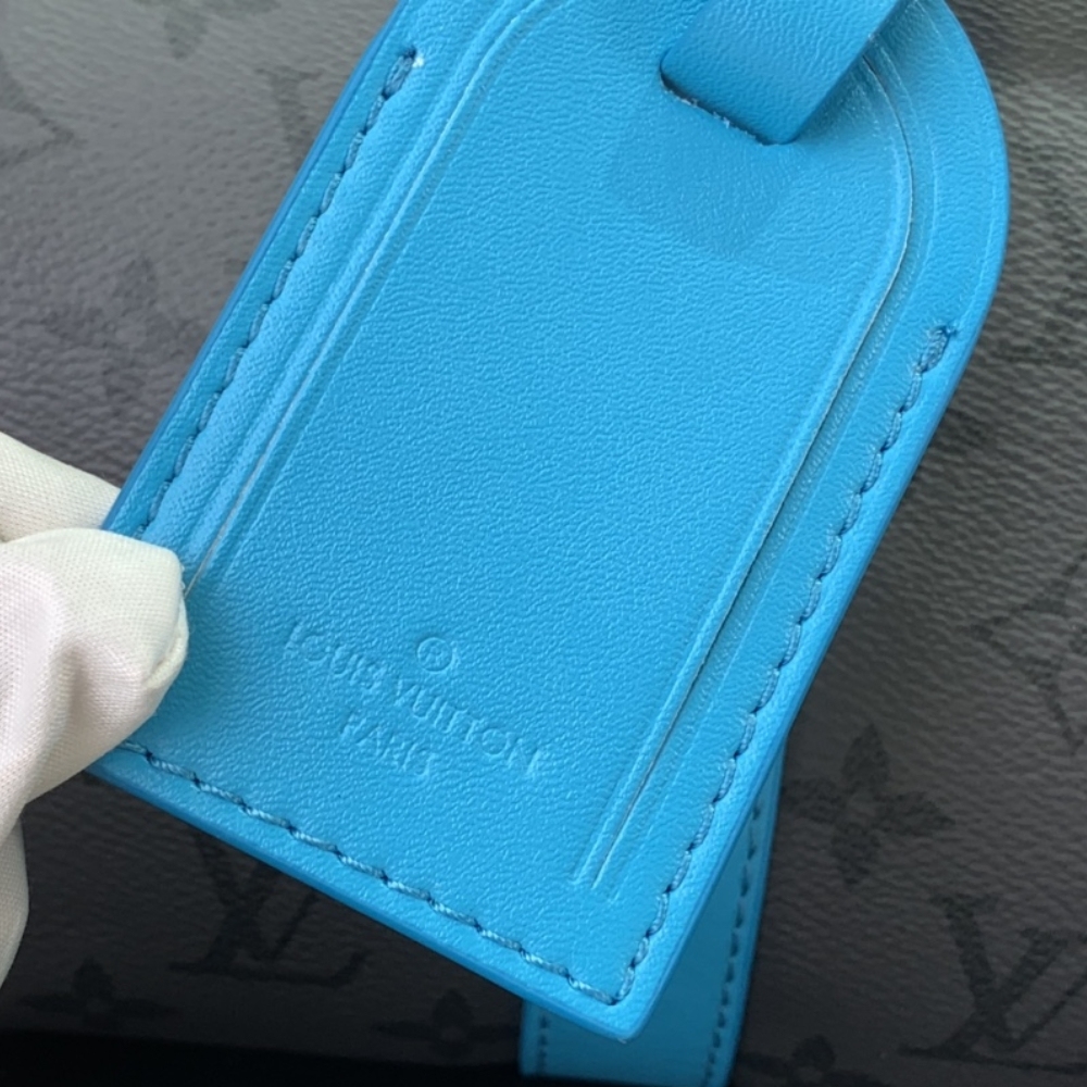 LV KEEPALL BANDOULIÈRE 25 MONOGRAM ECLIPSE REVERSE TURQUOISE 25CM M11645