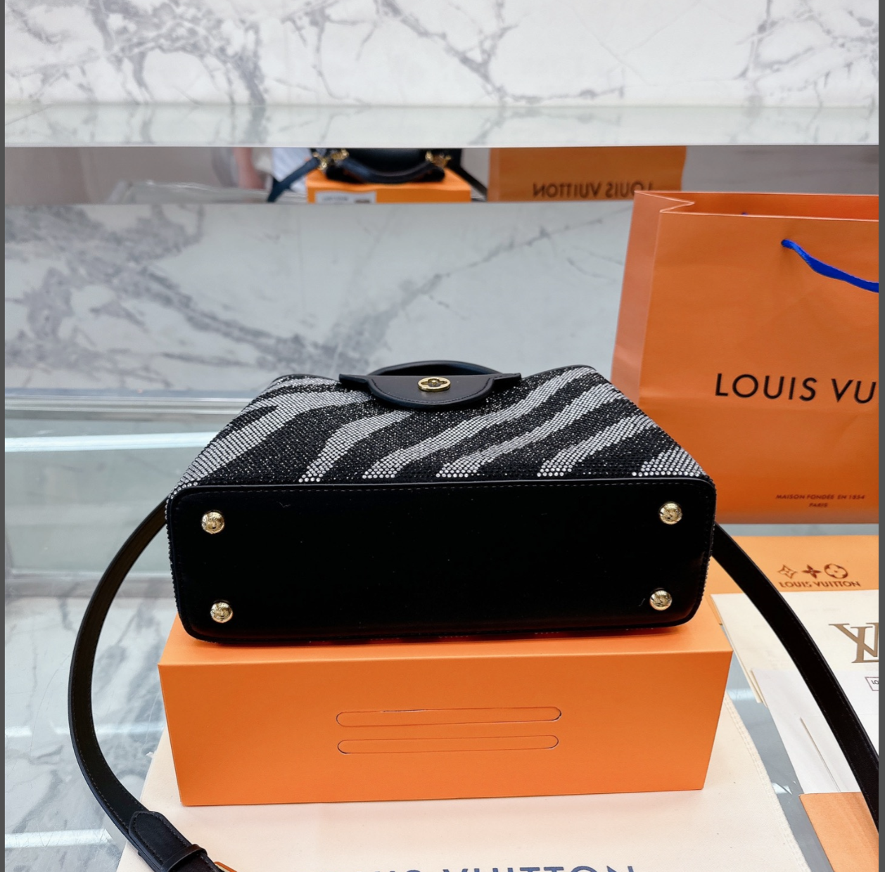 LV CAPUCINES MM BLACK AND GREY ZEBRA PATTERN 27CM M58517