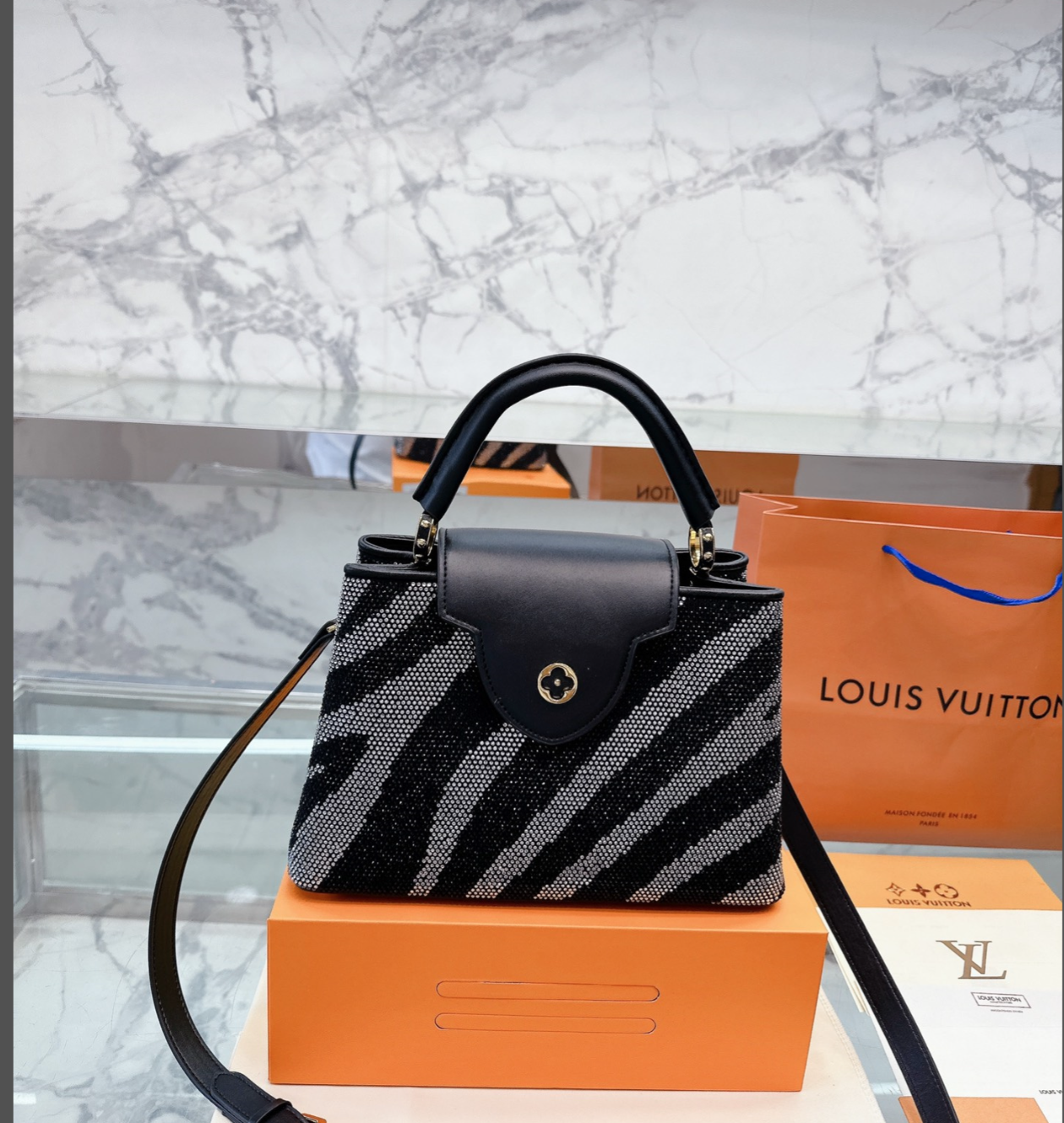 LV CAPUCINES MM BLACK AND GREY ZEBRA PATTERN 27CM M58517