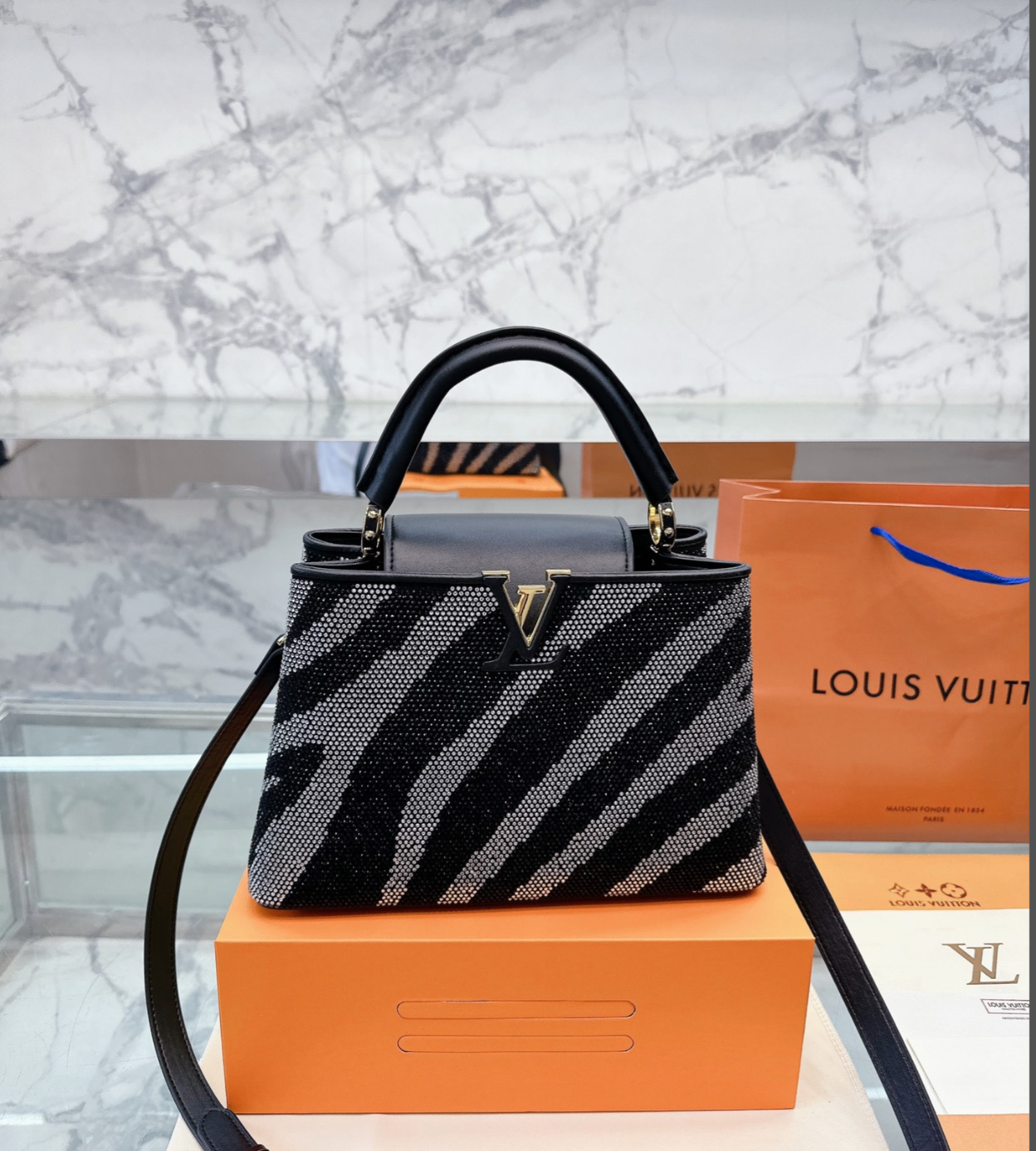 LV CAPUCINES MM BLACK AND GREY ZEBRA PATTERN 27CM M58517