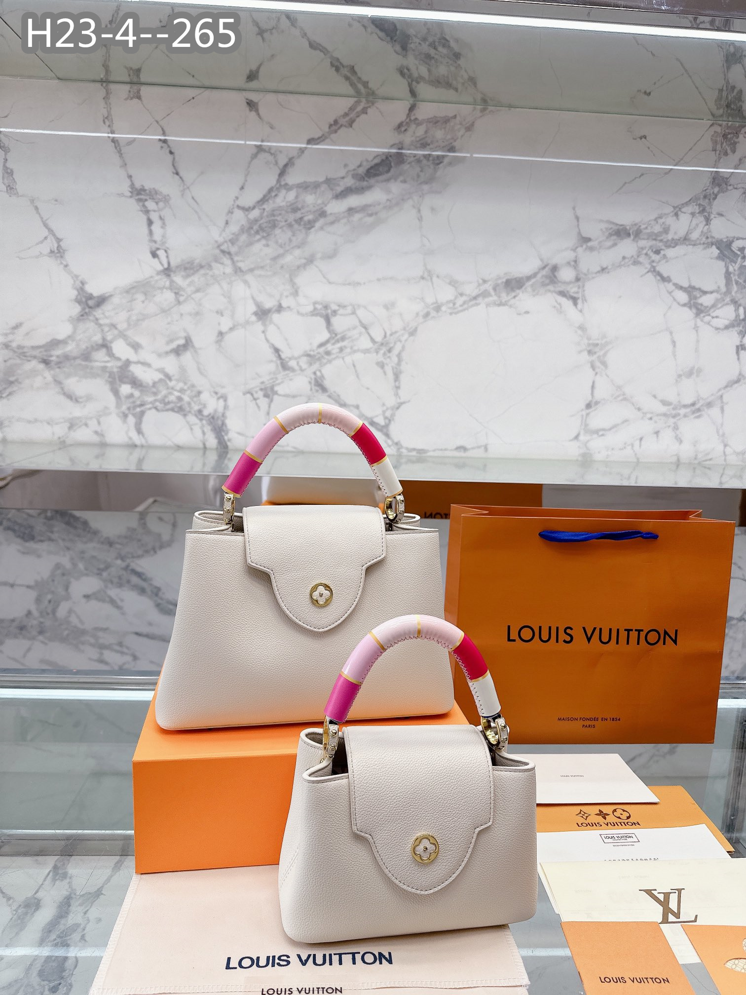 LV CAPUCINES BB PINK AND WHITE 27CM M21646