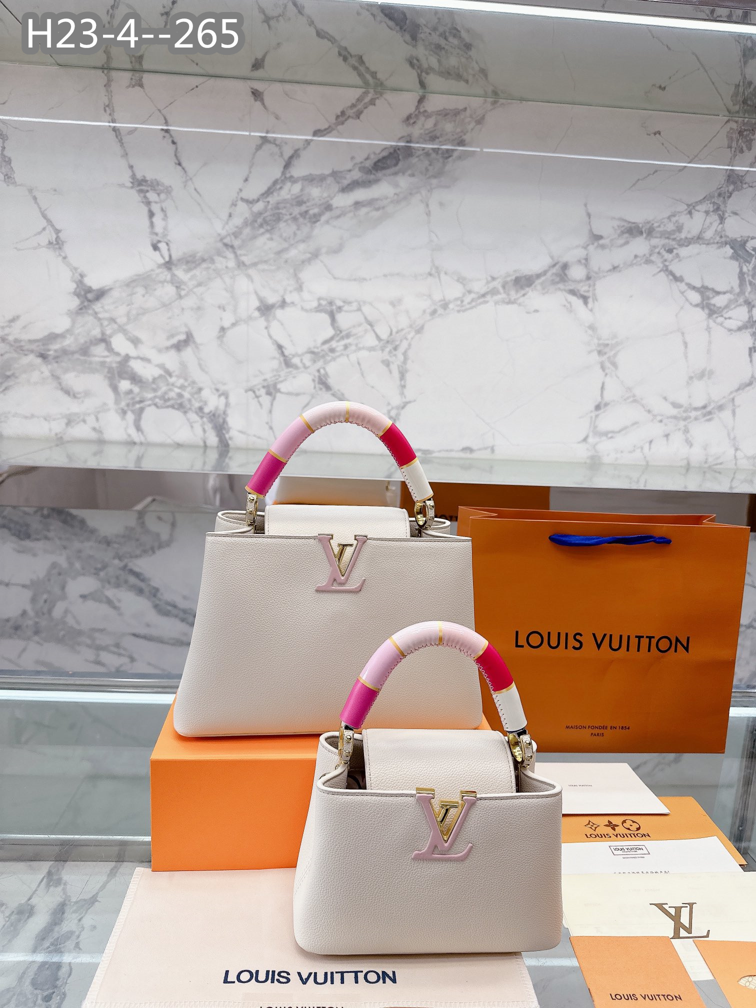 LV CAPUCINES BB PINK AND WHITE 27CM M21646