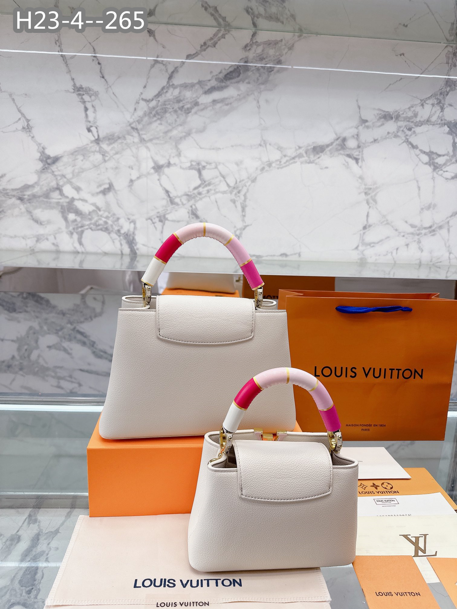LV CAPUCINES BB PINK AND WHITE 27CM M21646