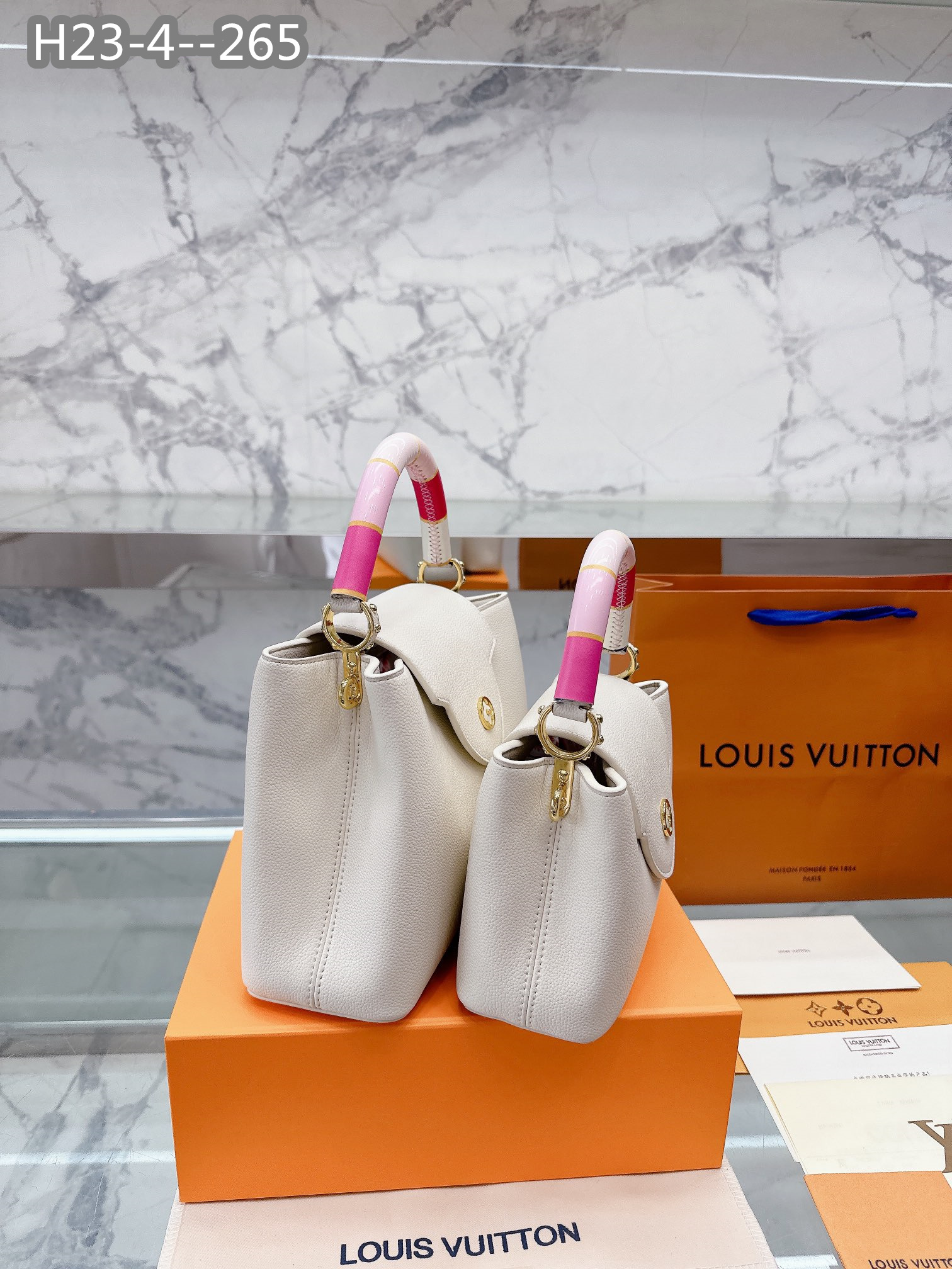LV CAPUCINES BB PINK AND WHITE 27CM M21646
