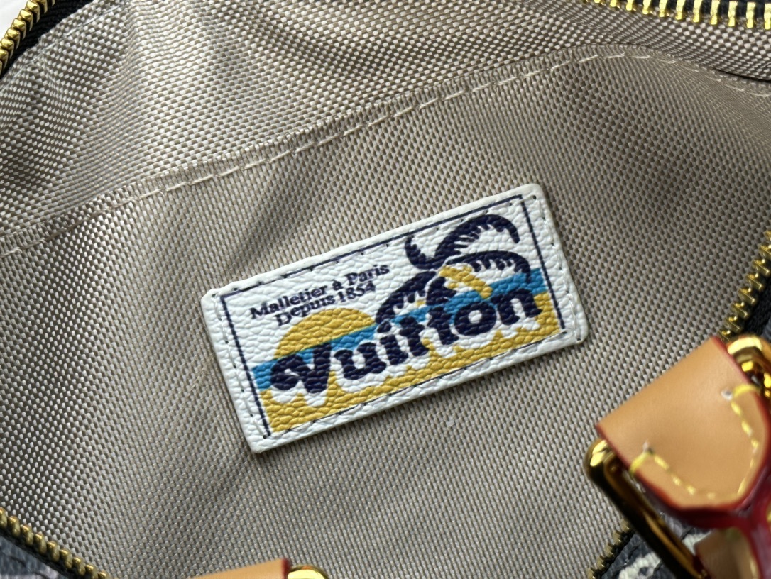 LV KEEPALL BANDOULIERE 25 NAVY BLUE 25CM M25440