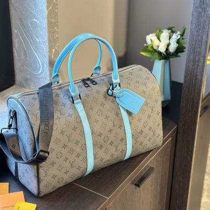 LV KEEPALL BANDOULIÈRE 45 MONOGRAM ECLIPSE REVERSE COATED CANVAS TURQUOISE 45CM M11481