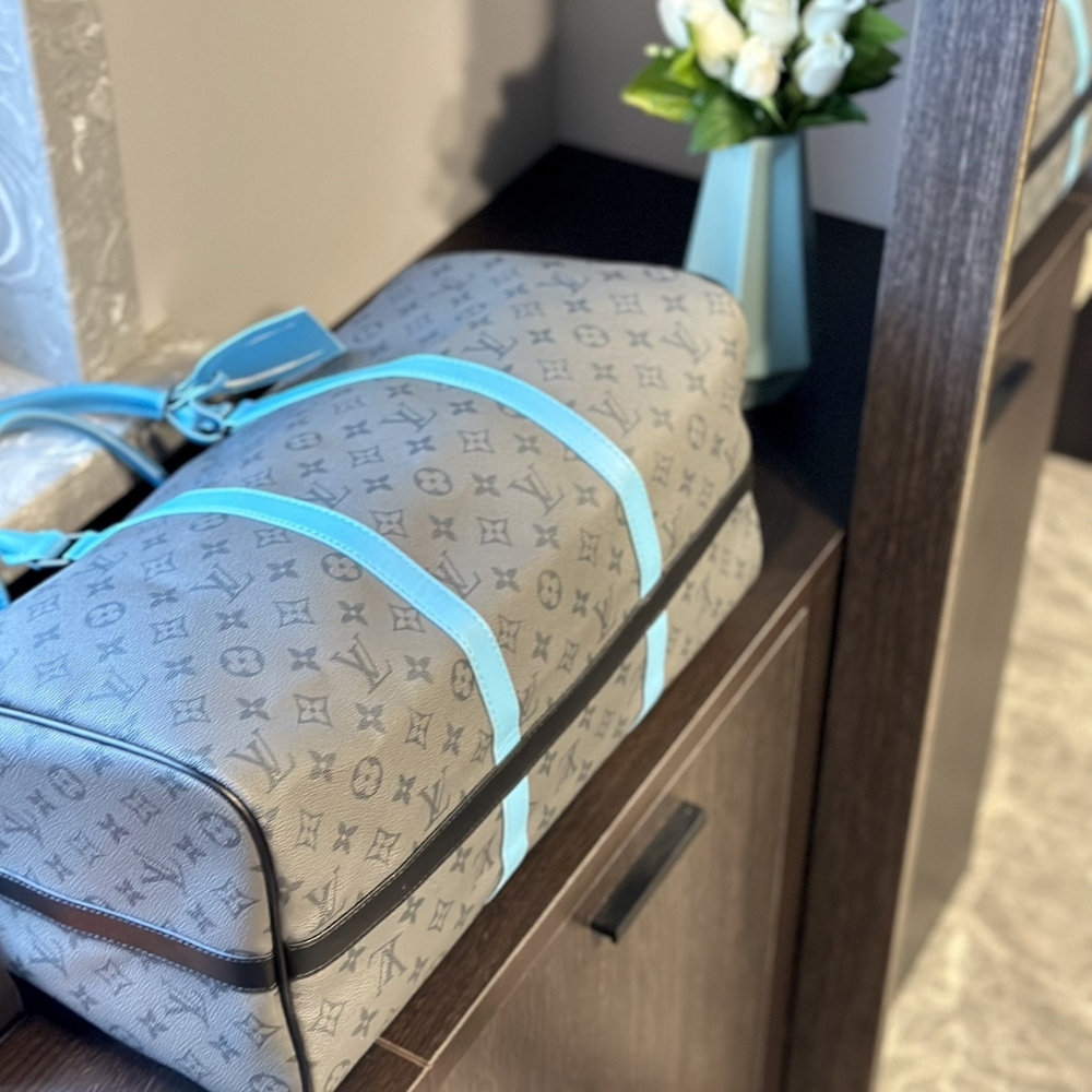 LV KEEPALL BANDOULIÈRE 45 MONOGRAM ECLIPSE REVERSE COATED CANVAS TURQUOISE 45CM M11481