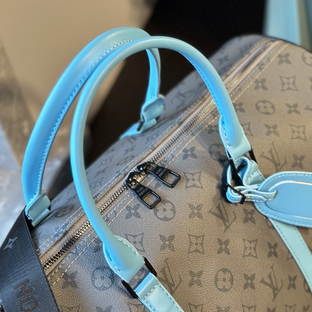 LV KEEPALL BANDOULIÈRE 45 MONOGRAM ECLIPSE REVERSE COATED CANVAS TURQUOISE 45CM M11481