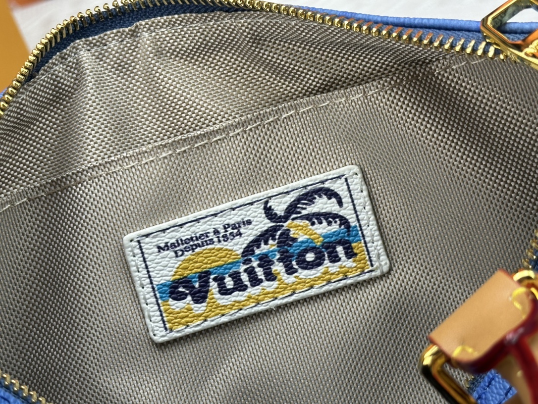 LV KEEPALL BANDOULIERE 25 BRIGHT BLUE 25CM M24999