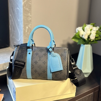 LV KEEPALL BANDOULIÈRE 25 MONOGRAM ECLIPSE REVERSE COATED CANVAS TURQUOISE 25CM M11645