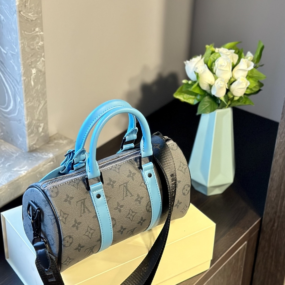 LV KEEPALL BANDOULIÈRE 25 MONOGRAM ECLIPSE REVERSE COATED CANVAS TURQUOISE 25CM M11645