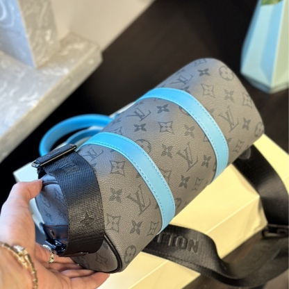 LV KEEPALL BANDOULIÈRE 25 MONOGRAM ECLIPSE REVERSE COATED CANVAS TURQUOISE 25CM M11645