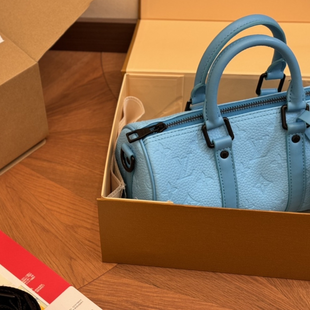 LV KEEPALL BANDOULIÈRE 25 TURQUOISE 25CM M11996