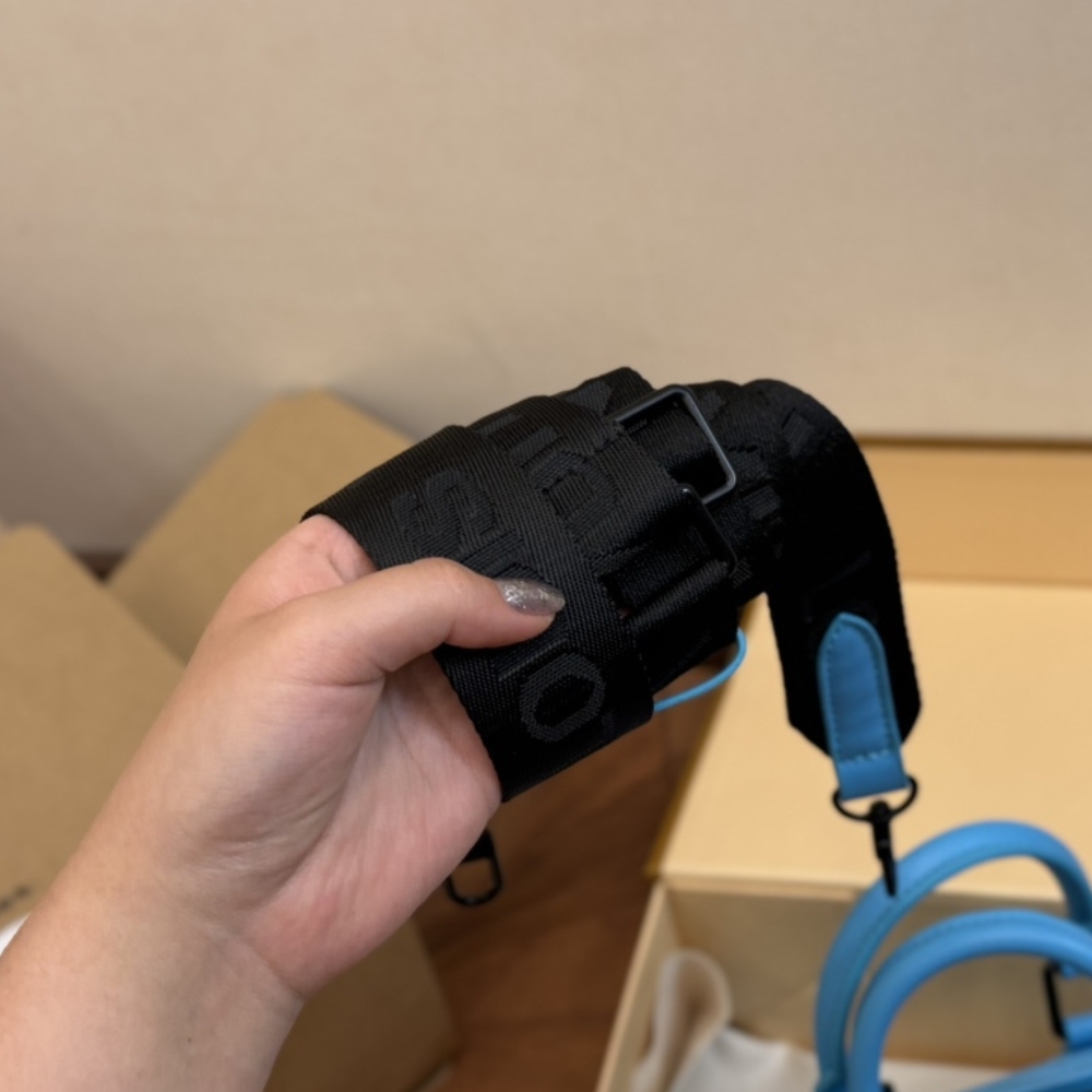 LV KEEPALL BANDOULIÈRE 25 TURQUOISE 25CM M11996