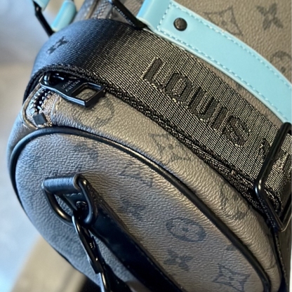 LV KEEPALL BANDOULIÈRE 25 MONOGRAM ECLIPSE REVERSE COATED CANVAS TURQUOISE 25CM M11645