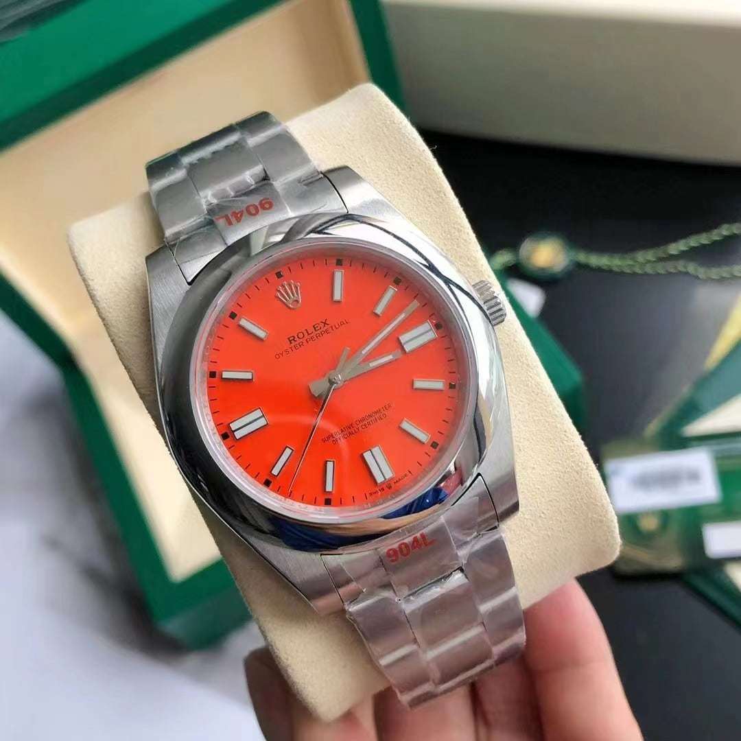ROLEX OYSTER PERPETUAL RED 36MM 124300