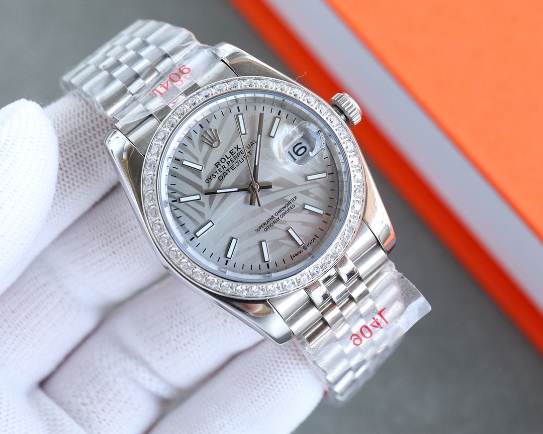 ROLEX DATEJUST SILVER DIAL WITH SILVER STRAP PALM LEAF PATTERN 36MM 126200 0086