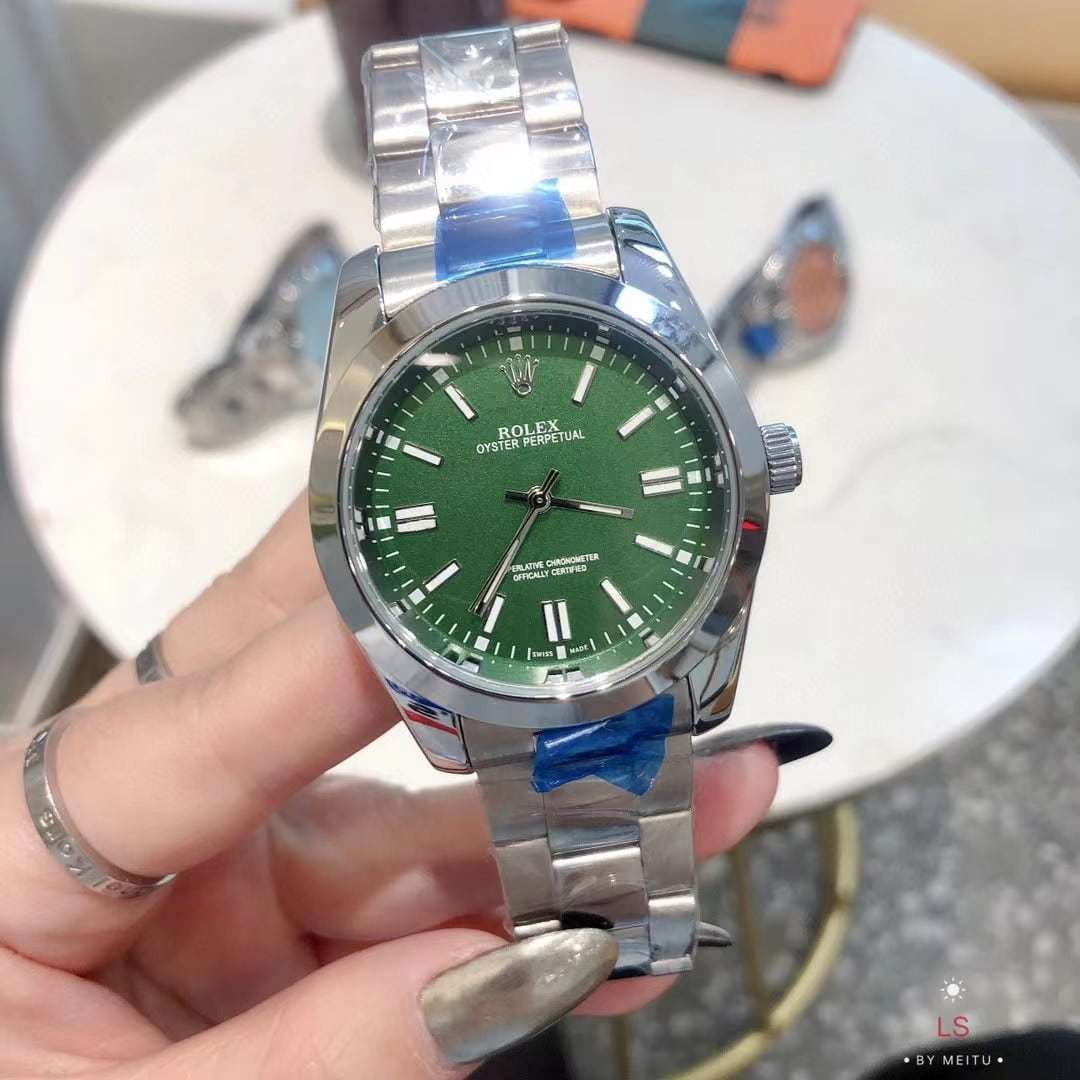 ROLEX OYSTER PERPETUAL WATCH 41MM GREEN DIAL 126000 0005