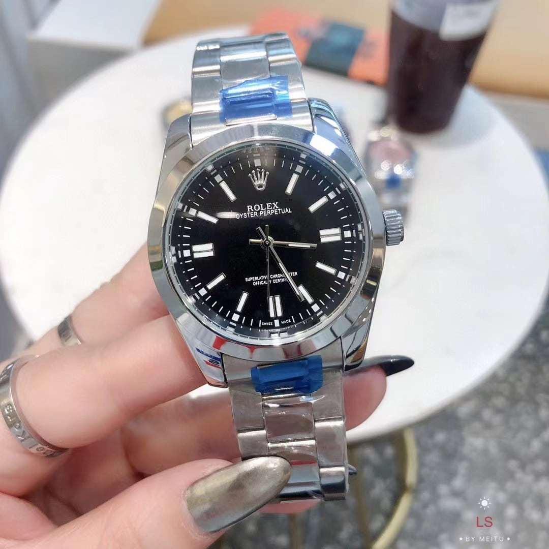 ROLEX OYSTER PERPETUAL WATCH 41MM BLACK DIAL 124300 0002