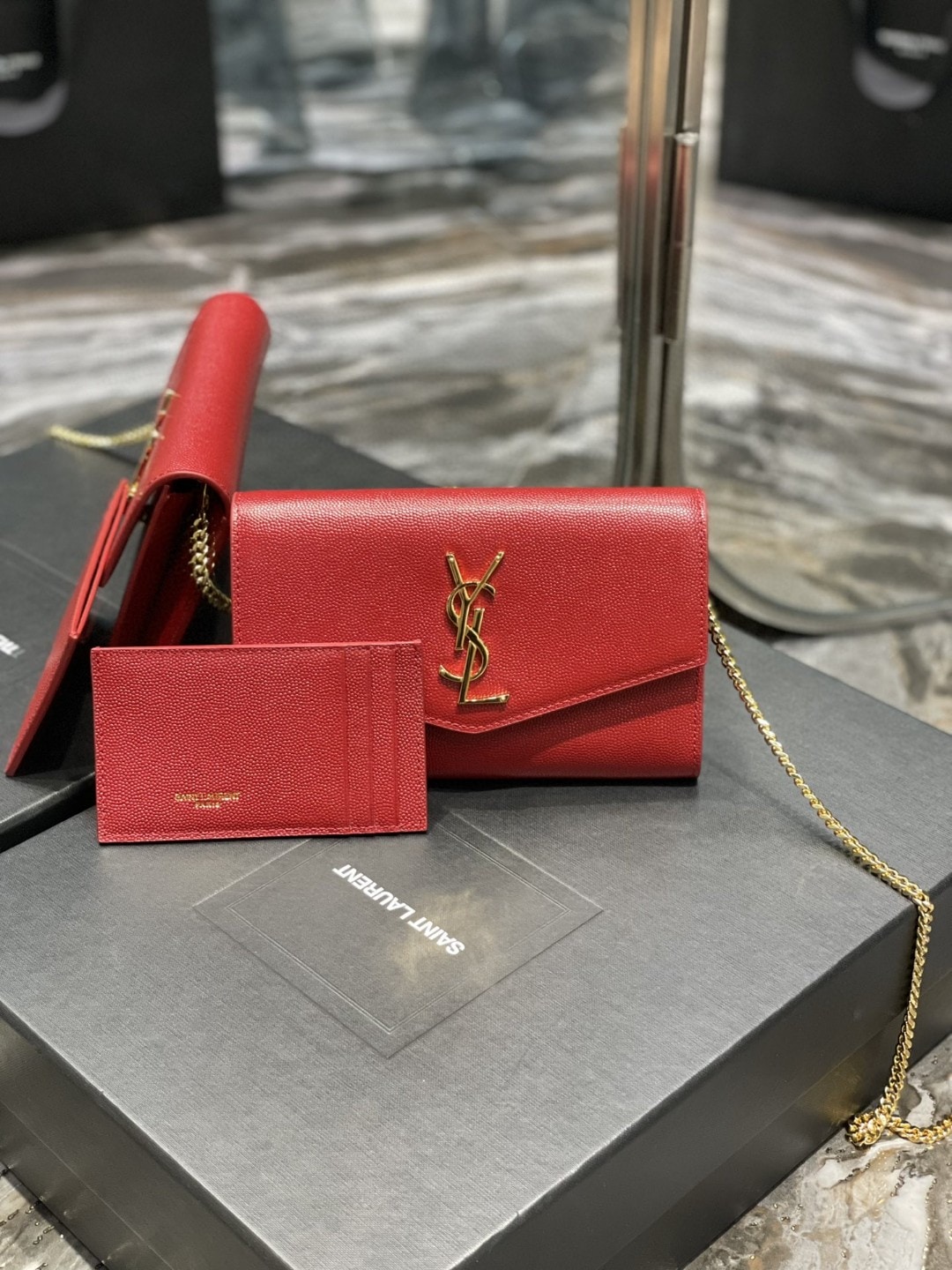 YSL UPTOWN CHAIN WALLET IN GRAIN DE POUDRE EMBOSSED LEATHER RED 19CM