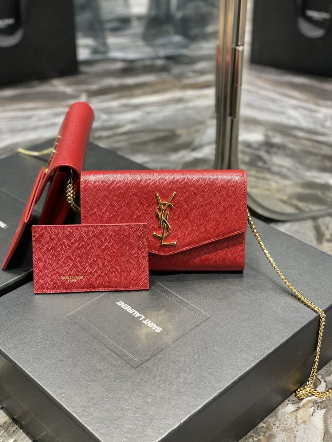 YSL UPTOWN CHAIN WALLET IN GRAIN DE POUDRE EMBOSSED LEATHER RED 19CM