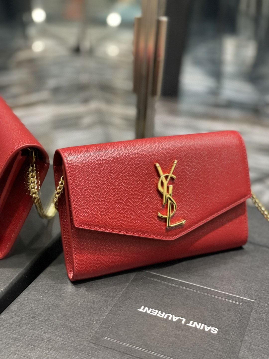 YSL UPTOWN CHAIN WALLET IN GRAIN DE POUDRE EMBOSSED LEATHER RED 19CM