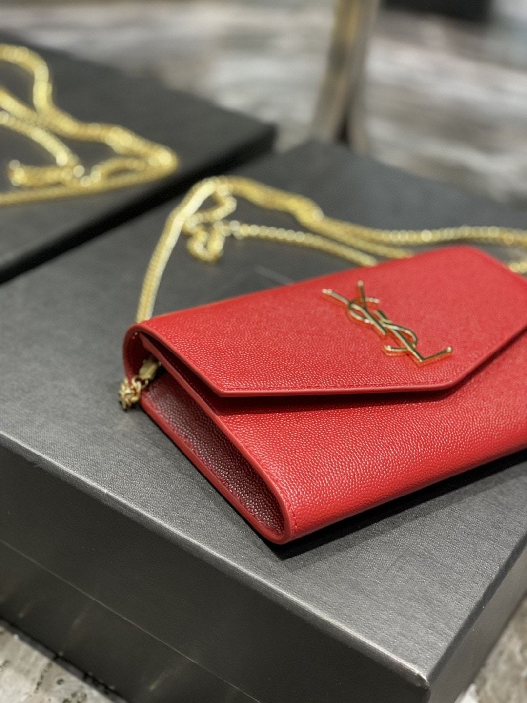 YSL UPTOWN CHAIN WALLET IN GRAIN DE POUDRE EMBOSSED LEATHER RED 19CM