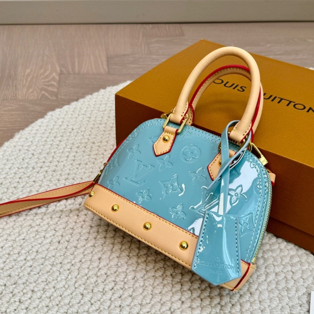 LV ALMA NANO MONOGRAM VERNIS EMBOSSED SKY 18CM M24062