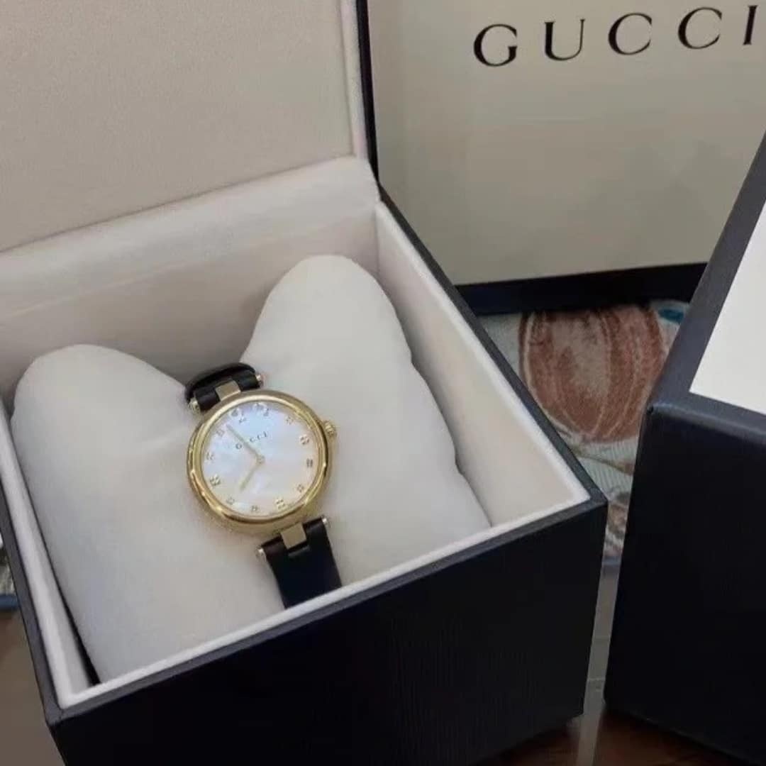 GUCCI DIAMANTISSIMA SWISS QUARTZ WITH BLACK STRAP AND GOLD TONE 27MM YA141404
