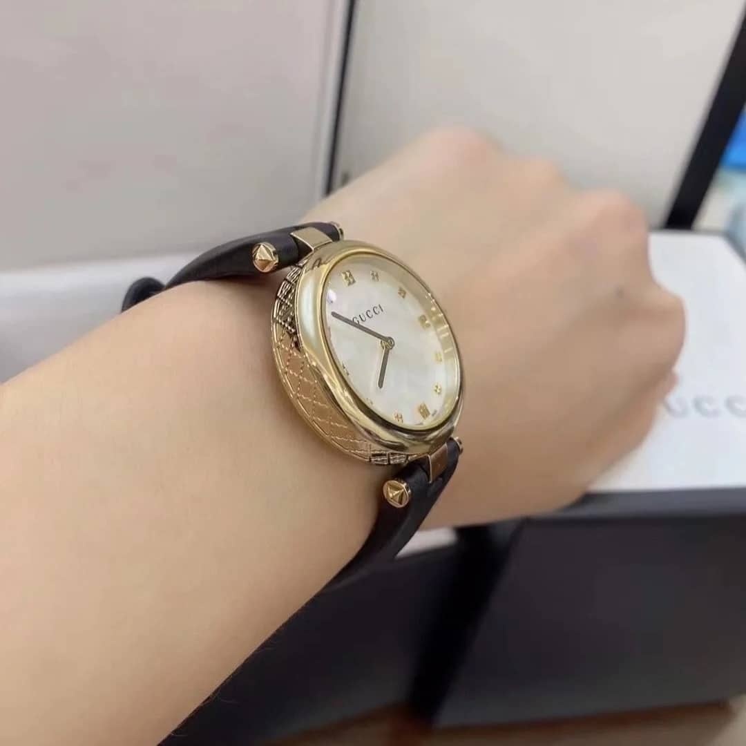 GUCCI DIAMANTISSIMA SWISS QUARTZ WITH BLACK STRAP AND GOLD TONE 27MM YA141404