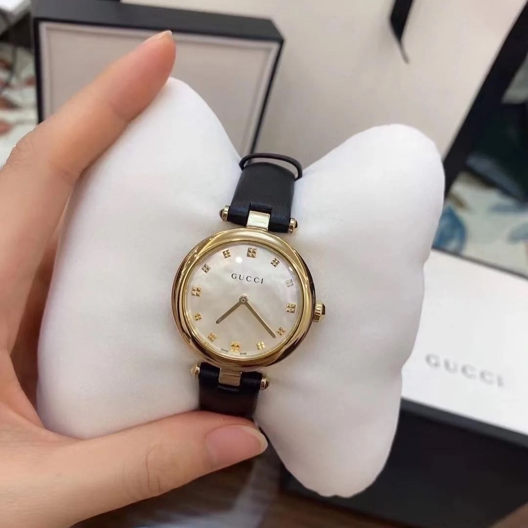 GUCCI DIAMANTISSIMA SWISS QUARTZ WITH BLACK STRAP AND GOLD TONE 27MM YA141404