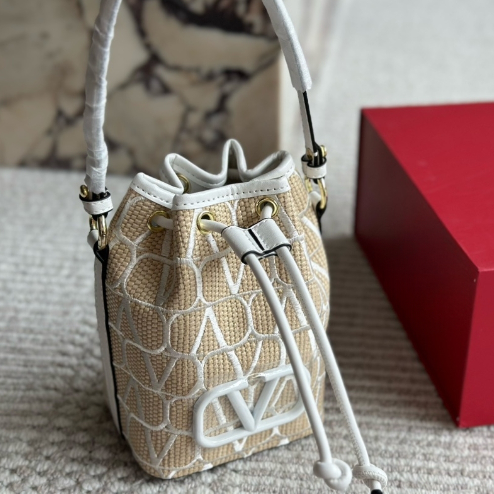 valen MINI VLOGO SIGNATURE BUCKET BAG IN TOILE ICONOGRAPHE BEIGE 22CM