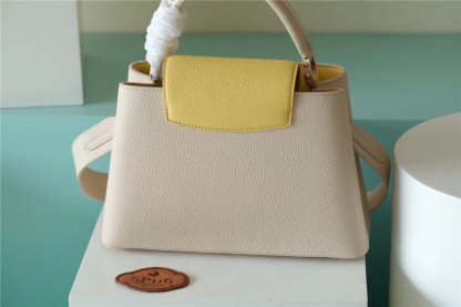 LV Capucines BB Taurillon Creme Beige/ Plume Yellow Berlingot For Women, Women’s Bags, Shoulder And Crossbody Bags 10.6in/27cm LV