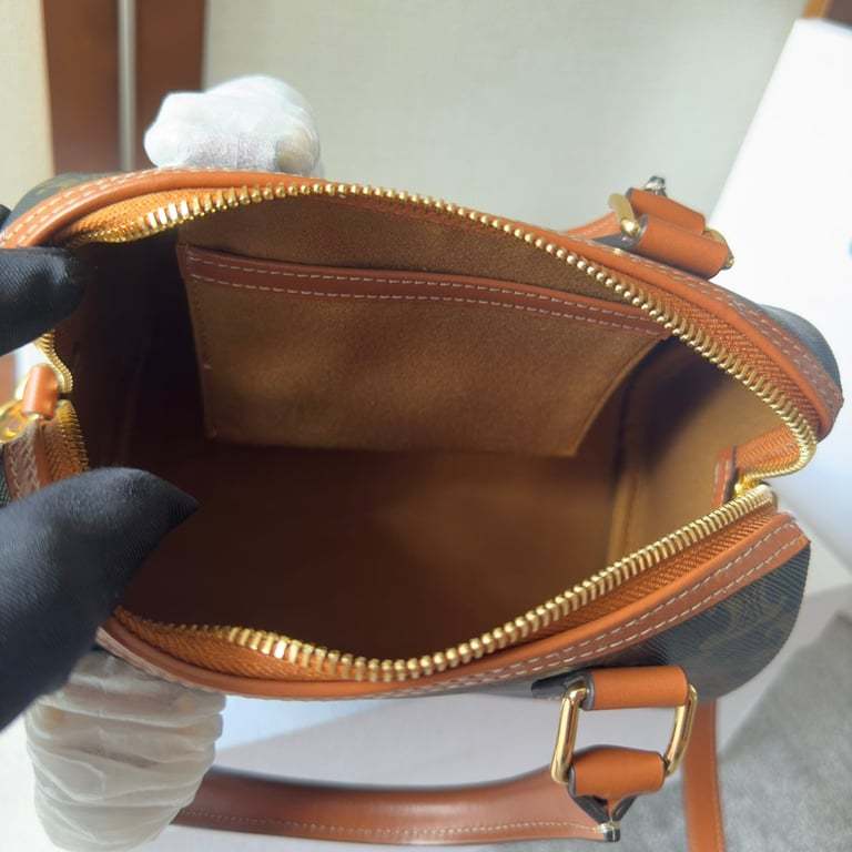 CE  SMALL BOSTON CUIR TRIOMPHE IN TRIOMPHE CANVAS AND CALFSKIN TAN