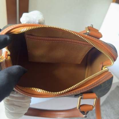 CE  SMALL BOSTON CUIR TRIOMPHE IN TRIOMPHE CANVAS AND CALFSKIN TAN