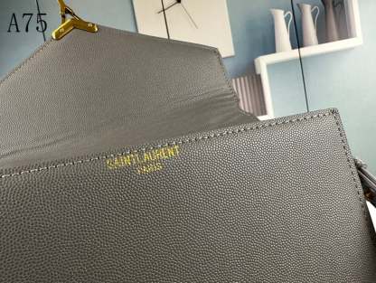 SAINT LAURENT CASSANDRA MEDIUM TOP HANDLE IN GRAIN DE POUDRE EMBOSSED FOG LEATHER 24CM