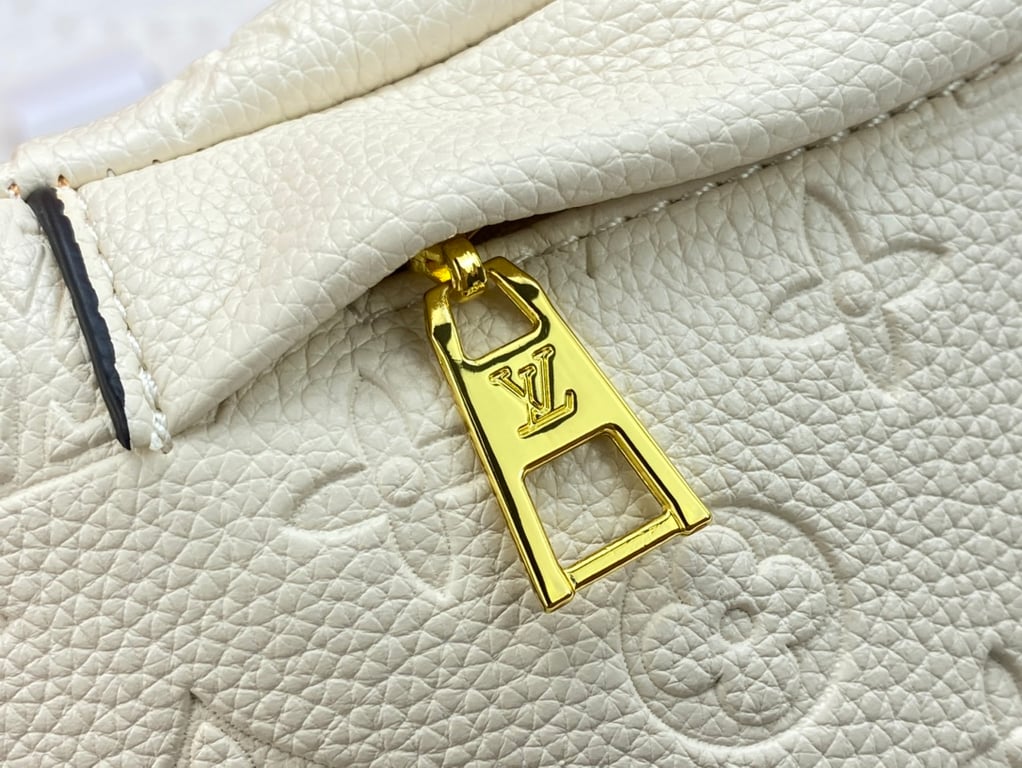 LUV MONOGRAM EMPREINTE CREME BUMBAG M44836