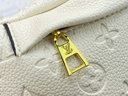 LUV MONOGRAM EMPREINTE CREME BUMBAG M44836