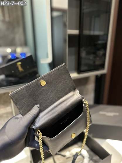 SAINT LAURENT UPTOWN YSL PLAQUE GRAINED LEATHER 18CM