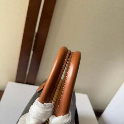 CE  SMALL BOSTON CUIR TRIOMPHE IN TRIOMPHE CANVAS AND CALFSKIN TAN