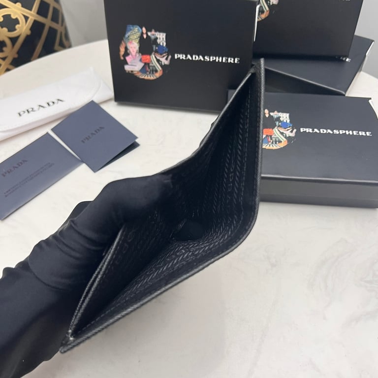 PR SMALL SAFFIANO LUX LEATHER FLAP CONTINENTAL TRIANGLE BLACK WALLET 10CM