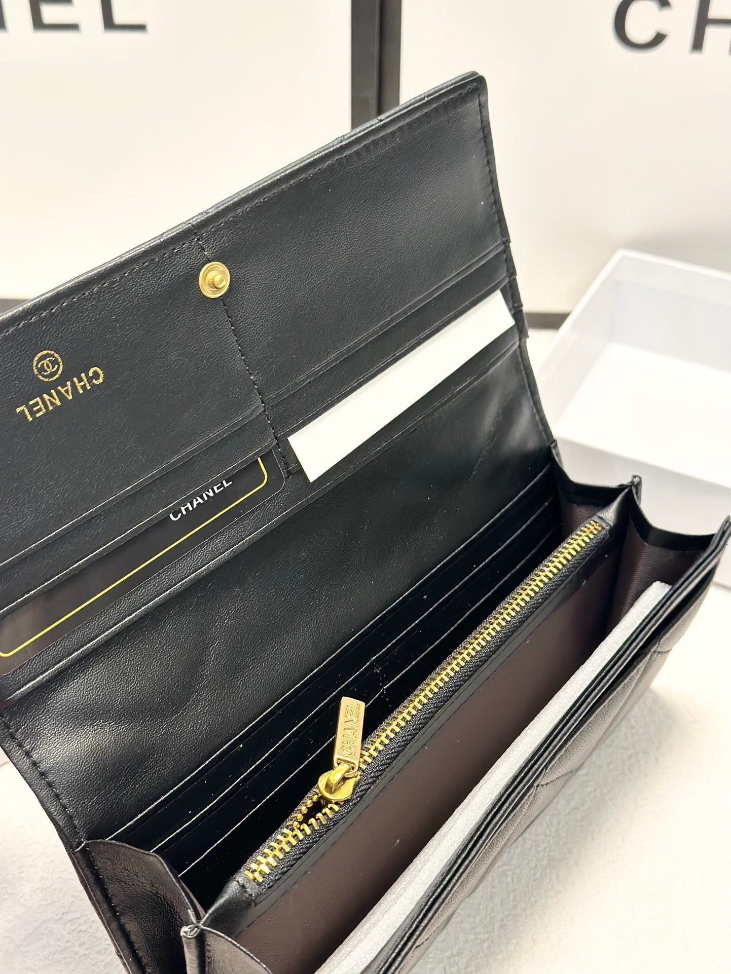 CHANEL Black Quilted Gold CC Flap 