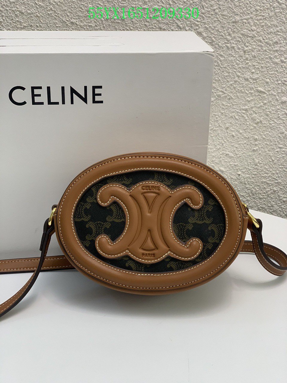 CE OVAL BAG CUIR TRIOMPHE IN TRIOMPHE CANVAS AND CALFSKIN TAN 20CM 198602EIN04LU