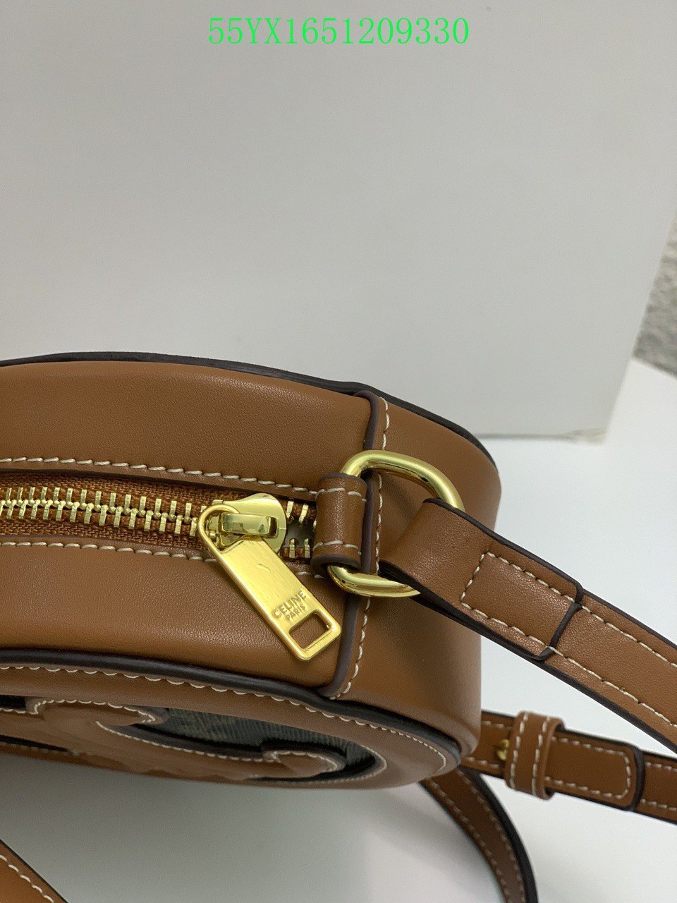 CE OVAL BAG CUIR TRIOMPHE IN TRIOMPHE CANVAS AND CALFSKIN TAN 20CM 198602EIN04LU